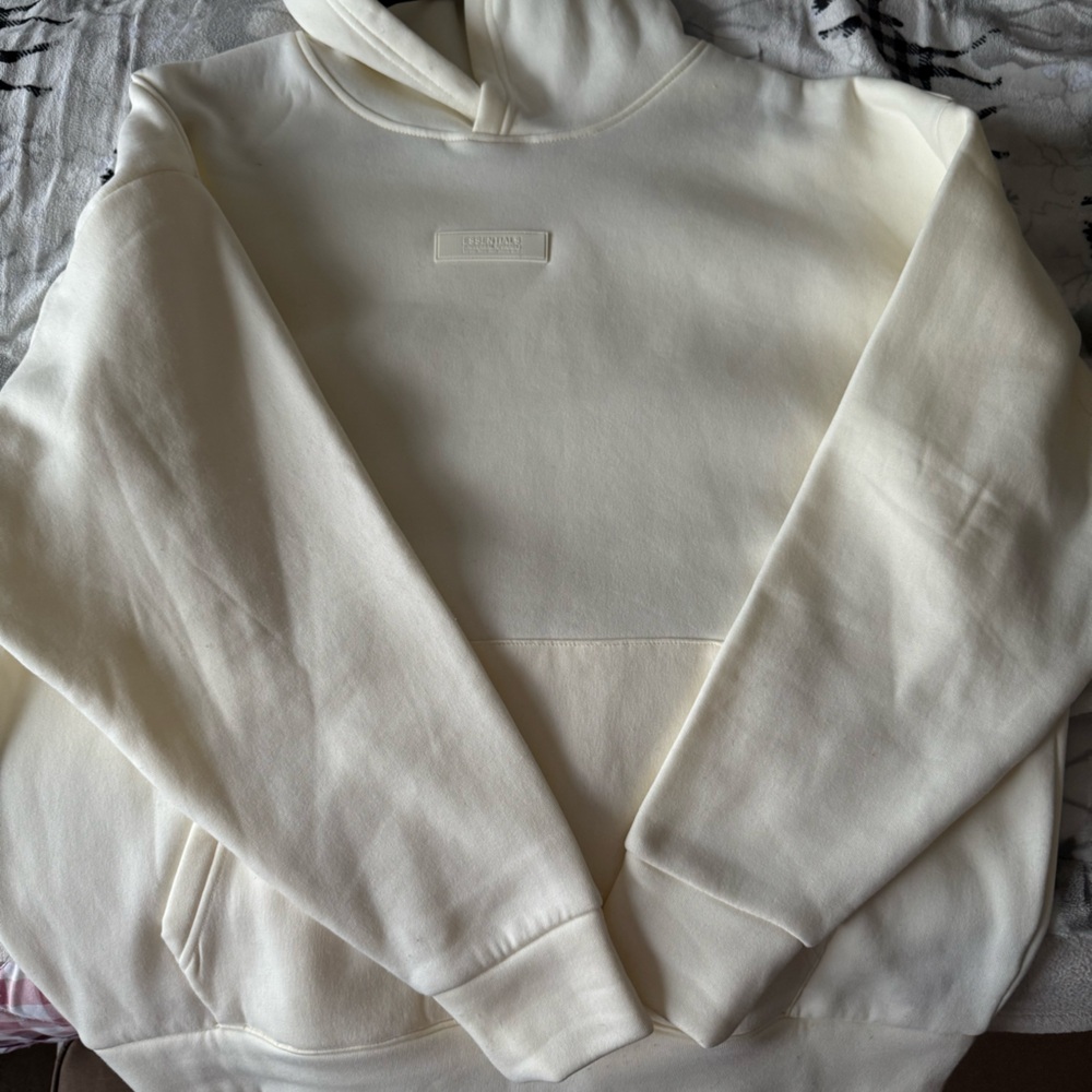 Cream essentials hoodie